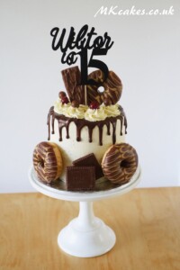 Dripping Birthday Cake with doughnuts MK Cakes | One-of-a-kind cakes for every occasion