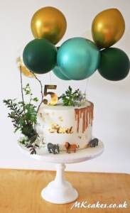 Jungle dripping Birthday Cake with balloon arch MK Cakes | One-of-a-kind cakes for every occasion