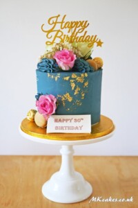 Blue and Gold Birthday Cake with Fresh Flowers Blue and Gold Birthday Cake with Fresh Flowers
