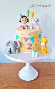 Pastel Jungle Cake with Birthday Girl Pastel Jungle Cake with Birthday Girl